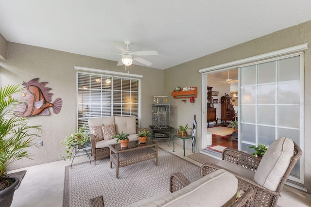 living room featuring ceiling fan