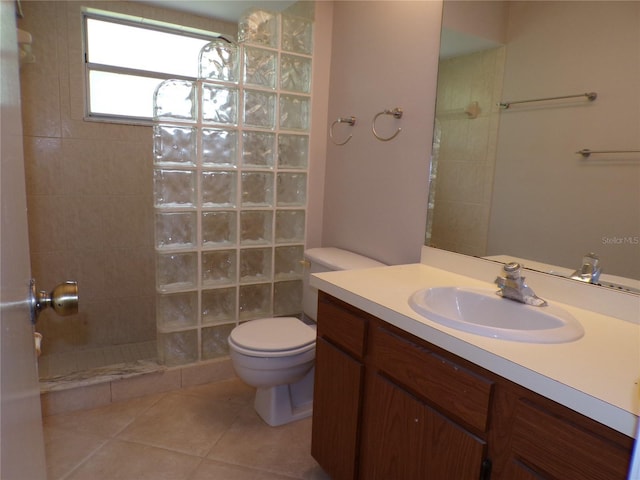 4973 Village Gardens Dr Unit 50, Sarasota, FL 34234 - bathroom with walk in shower, vanity, and tile patterned floors