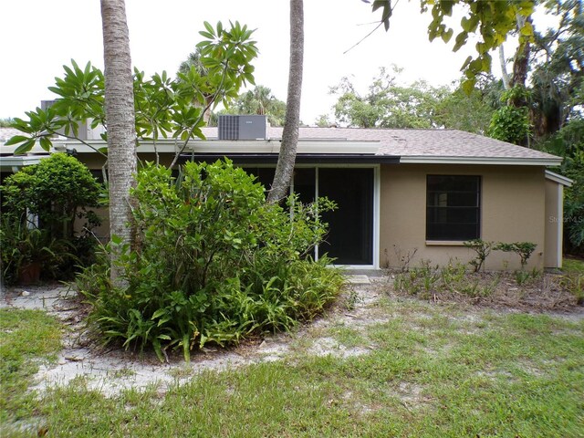 4973 Village Gardens Dr Unit 50, Sarasota, FL 34234 - rear view of property with stucco siding