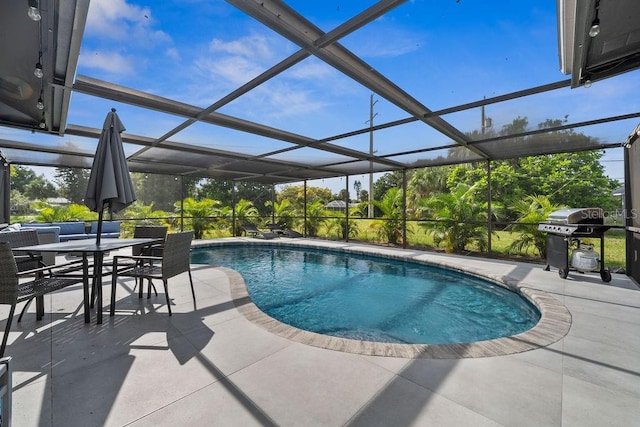 243 Moss Ln, Venice, FL 34293 - outdoor pool featuring a patio, a grill, a lanai, and outdoor dining area