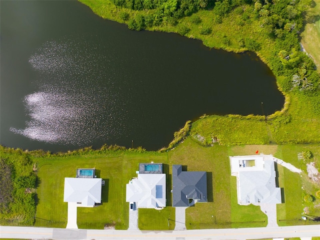 drone / aerial view featuring a water view