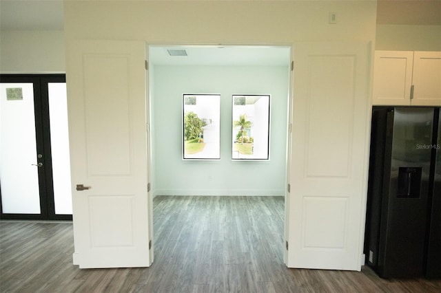 interior space with dark hardwood / wood-style flooring