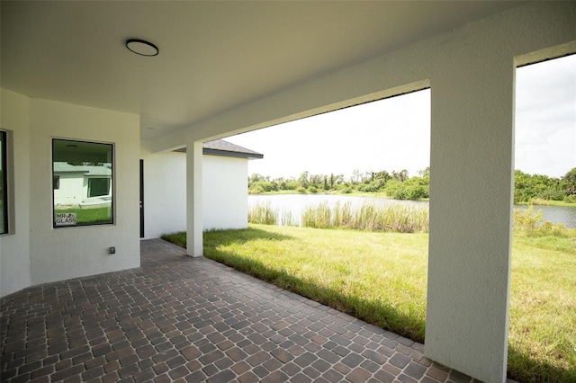 view of patio / terrace featuring a water view