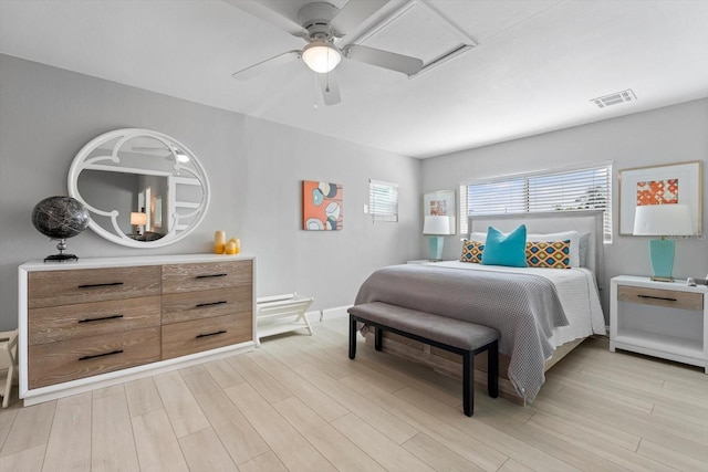 bedroom with light wood-type flooring and ceiling fan