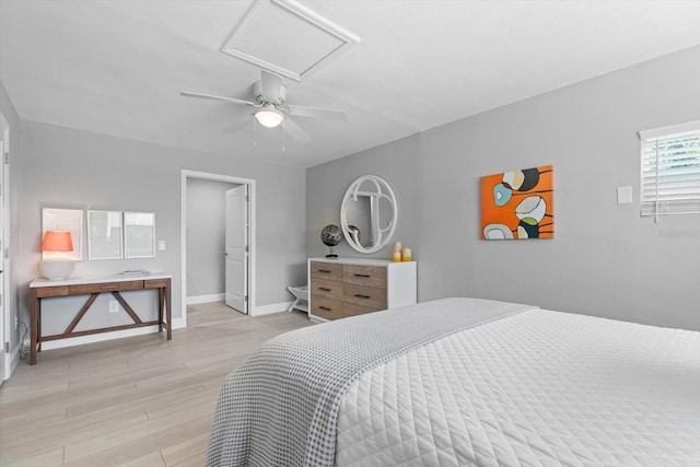 bedroom featuring light hardwood / wood-style floors and ceiling fan