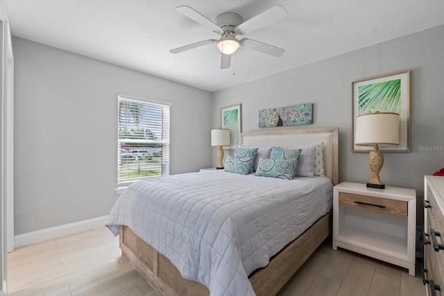 bedroom featuring ceiling fan and light wood-type flooring