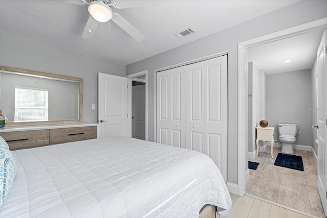 bedroom featuring a closet, ceiling fan, and light wood-type flooring