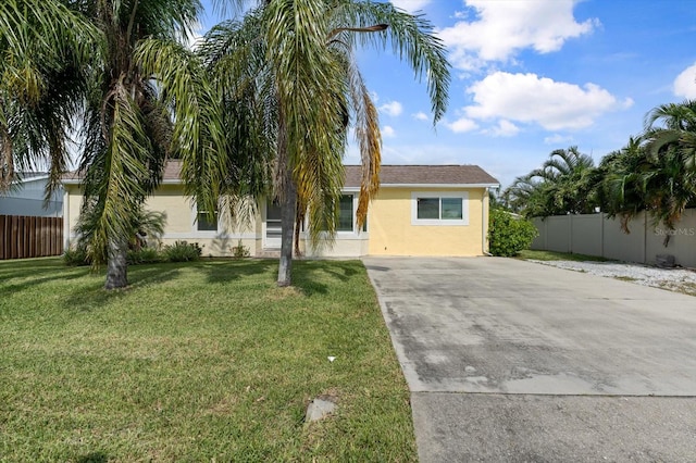 view of front of home with a front lawn