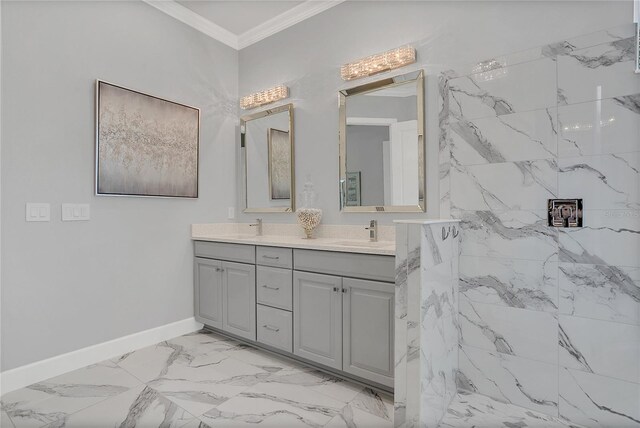 bathroom with crown molding and vanity