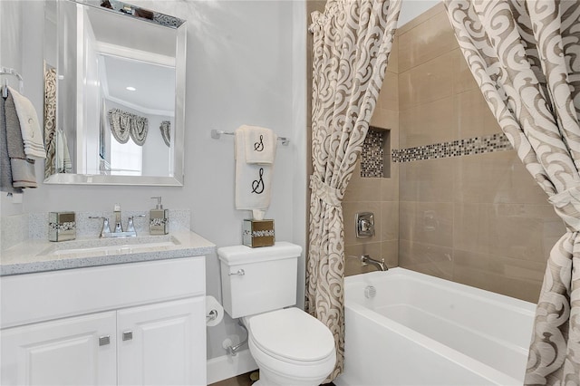 full bathroom featuring shower / bath combo, toilet, and vanity