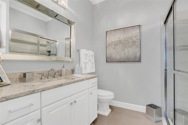 bathroom with vanity, toilet, and walk in shower