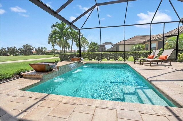 view of swimming pool with a lanai, a patio, and pool water feature