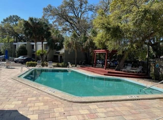 view of pool featuring a patio