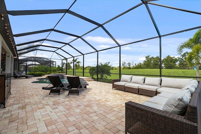 view of patio with an outdoor living space and a lanai