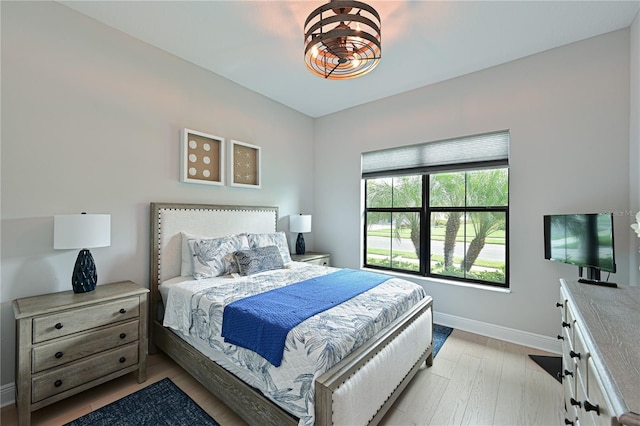 bedroom with light wood-type flooring