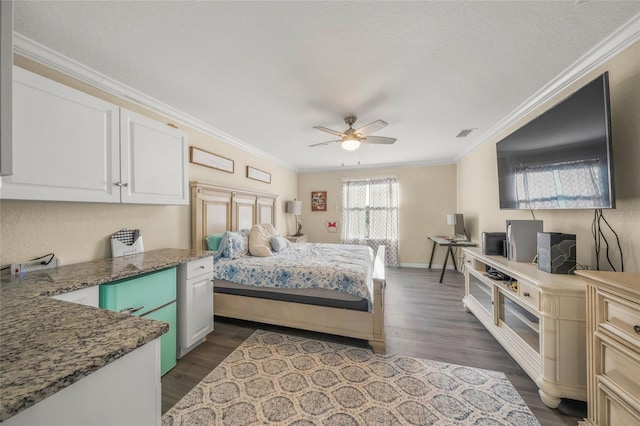 bedroom featuring crown molding, dark hardwood / wood-style flooring, and ceiling fan