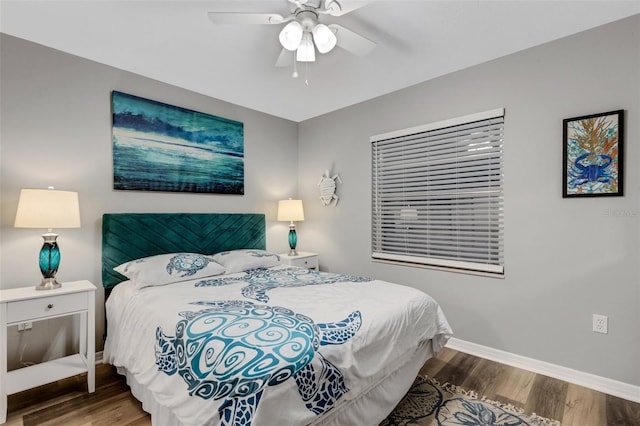 bedroom with wood-type flooring and ceiling fan