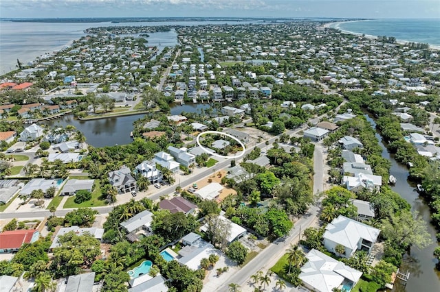 136 Crescent Dr, Anna Maria, FL 34216 - drone / aerial view with a water view and a residential view