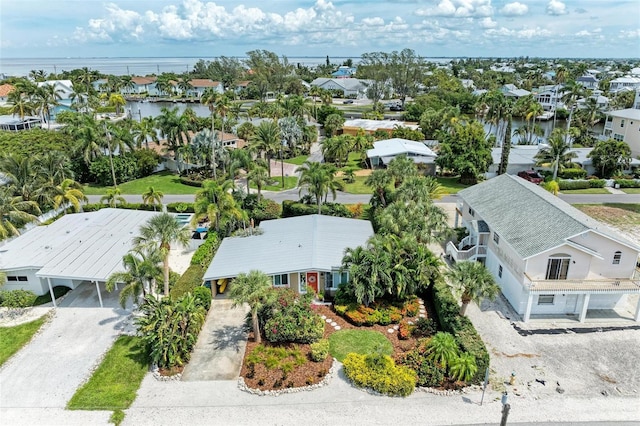 136 Crescent Dr, Anna Maria, FL 34216 - drone / aerial view featuring a residential view and a water view