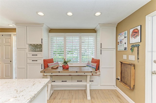 136 Crescent Dr, Anna Maria, FL 34216 - dining area featuring recessed lighting, baseboards, and light wood-style floors