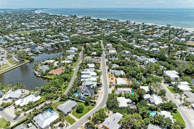 136 Crescent Dr, Anna Maria, FL 34216 - aerial view featuring a water view and a residential view