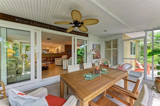 136 Crescent Dr, Anna Maria, FL 34216 - sunroom / solarium featuring ceiling fan and wood finished floors