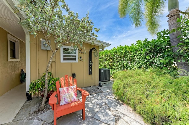 136 Crescent Dr, Anna Maria, FL 34216 - view of patio with central AC unit