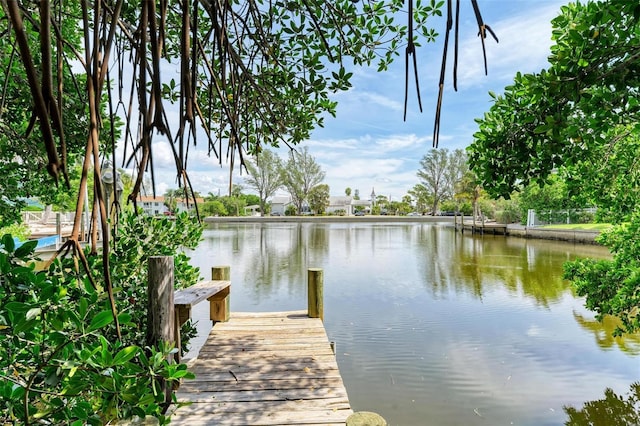 136 Crescent Dr, Anna Maria, FL 34216 - dock area featuring a water view