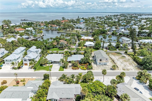 136 Crescent Dr, Anna Maria, FL 34216 - bird's eye view with a residential view and a water view