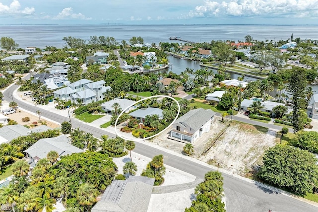 136 Crescent Dr, Anna Maria, FL 34216 - bird's eye view featuring a residential view and a water view