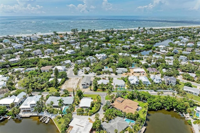 136 Crescent Dr, Anna Maria, FL 34216 - aerial view featuring a water view and a residential view