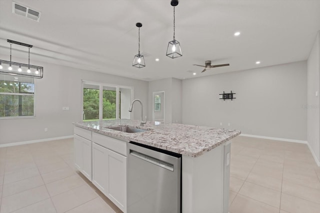 kitchen featuring a center island with sink, stainless steel dishwasher, sink, white cabinetry, and ceiling fan