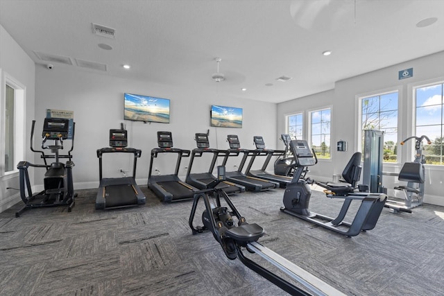 workout area with dark carpet and ceiling fan