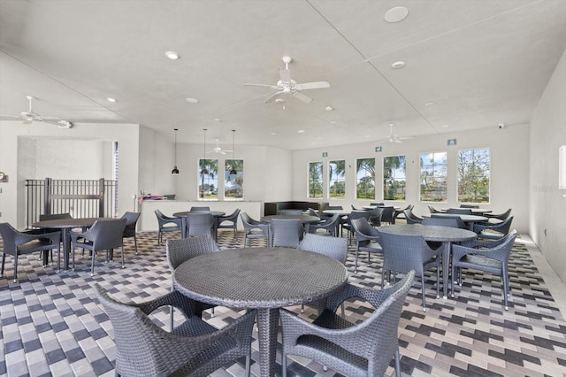 dining space with ceiling fan