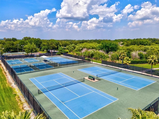 view of sport court featuring basketball hoop