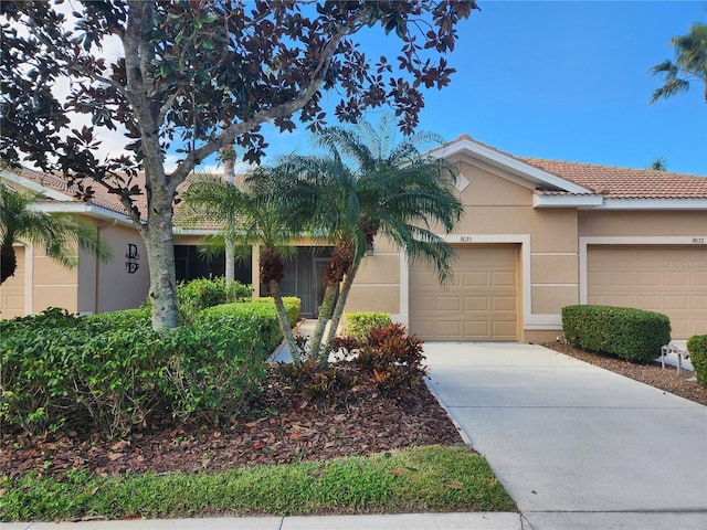 single story home with a garage