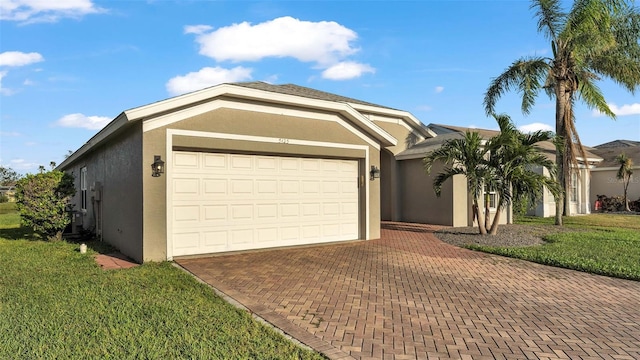 single story home with a front lawn and a garage