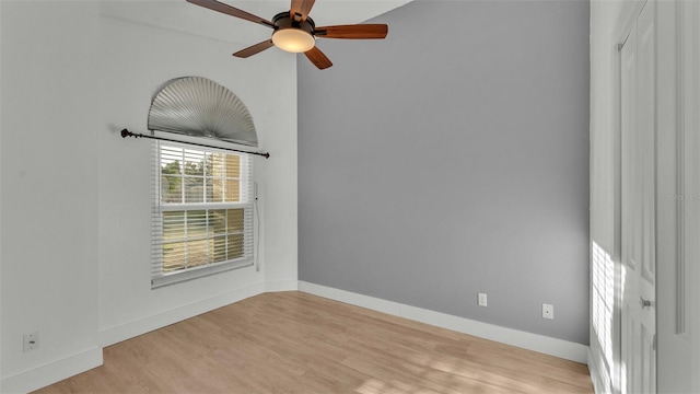 empty room featuring light wood-type flooring and ceiling fan