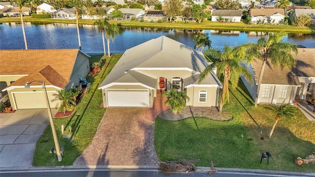 drone / aerial view with a water view