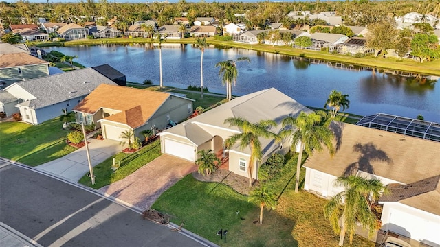 bird's eye view with a water view