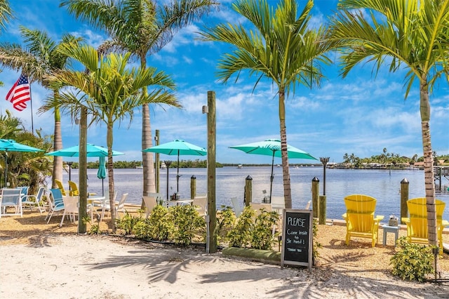 property view of water featuring a boat dock