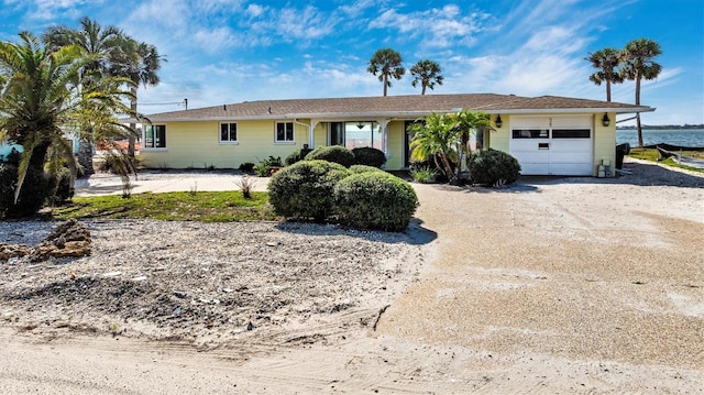 single story home with a garage