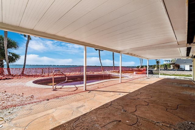 view of patio / terrace with a water view