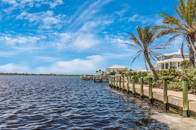 property view of water featuring a boat dock