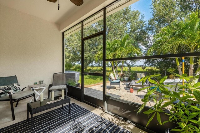 8798 Tuscany Isles Dr, Punta Gorda, FL 33950 - sunroom / solarium featuring a ceiling fan