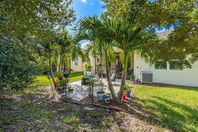8798 Tuscany Isles Dr, Punta Gorda, FL 33950 - view of yard featuring central air condition unit and a patio area