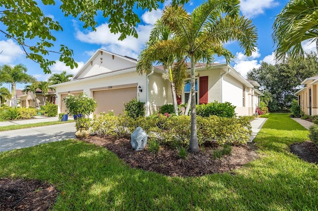 ranch-style house featuring a garage and a front yard