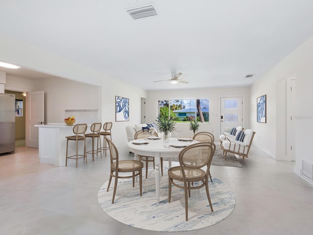 dining room featuring ceiling fan