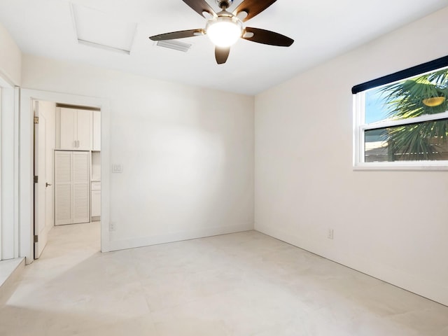 unfurnished room featuring ceiling fan