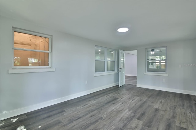 2912 Pinecrest Way, Sarasota, FL 34239 - empty room with dark wood-type flooring and baseboards